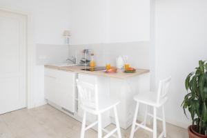 Kuchnia lub aneks kuchenny w obiekcie Piotrkowska Welcome Apartments