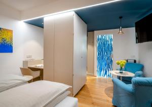 Katil atau katil-katil dalam bilik di Boutique Hotel Hauser