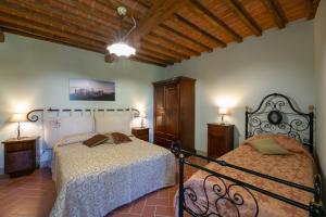 Ένα ή περισσότερα κρεβάτια σε δωμάτιο στο Agriturismo Borgo Dante +18 φωτογραφίες