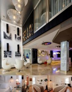 a living room with couches and chairs in a building at Evenia Rocafort in Barcelona