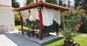 A garden outside Agapi Apartments