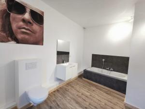 TV a/nebo společenská místnost v ubytování Luxury Spa Hotel - Francofolies
