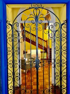 a doorway leading to a room with a large mirror at Maison Dormoy in Marseille