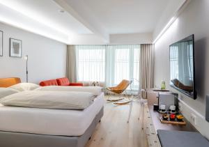 Televisyen dan/atau pusat hiburan di Boutique Hotel Hauser