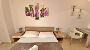 Posteľ alebo postele v izbe v ubytovaní Apartments Nemira