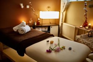 Ένα ή περισσότερα κρεβάτια σε δωμάτιο στο Hotel Rehavital