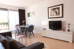 TV a/nebo společenská místnost v ubytování Plaza Catalunya City Center Apartments