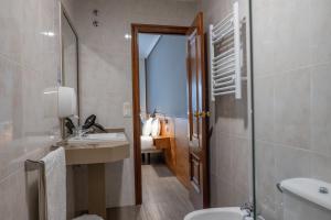 Ванная комната в Hotel Carlos 96
