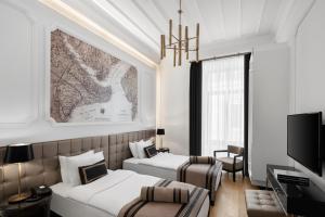 A television and/or entertainment centre at AKKA Lush Hotel Taksim