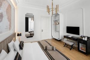 A television and/or entertainment centre at AKKA Lush Hotel Taksim