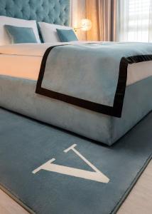 Letto o letti in una camera di Hotel Vatel 4* Superior