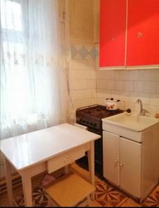Η κουζίνα ή μικρή κουζίνα στο Рядом с Автовокзалом