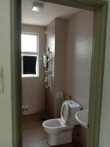 a bathroom with a toilet and a sink at Galina Somersquare Goldenhills Aprt Pasar Malam Cameron Highlands in Brinchang +15 photos