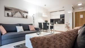 Kuchyňa alebo kuchynka v ubytovaní Apartamenty Sun & Snow Resort Karkonosze