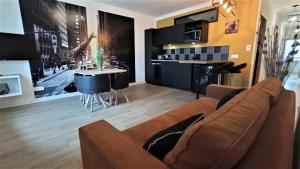 Η κουζίνα ή μικρή κουζίνα στο Appartements Aux Portes d'Alès - Centre Ville +3 φωτογραφίες