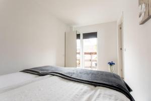 Gulta vai gultas numurā naktsmītnē Alkmaar City Apartments