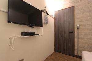 Televisyen dan/atau pusat hiburan di 張三旅宿Zhang San Guest House