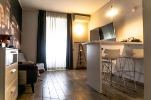 Kuchyň nebo kuchyňský kout v ubytování Aparthotel Meneghino