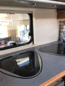 a view of the inside of an rv with a sink at Husvagn i Hundfjället Sälen in Sälen