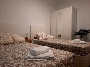 Posteľ alebo postele v izbe v ubytovaní Sunset Beach