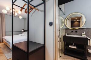 Postel nebo postele na pokoji v ubytování Alice Hotel