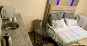 Cama o camas de una habitación en Made Guest House