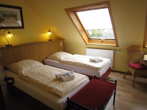 Postel nebo postele na pokoji v ubytování Hotel Henriette Davidis