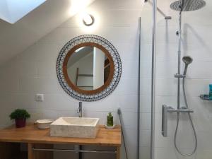 a bathroom with a sink and a shower at Appartement en duplex centre-ville BOHEME in Vannes +41 photos