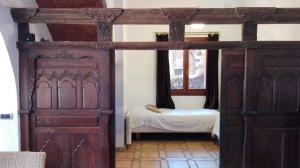 Postel nebo postele na pokoji v ubytování Casa Argentera
