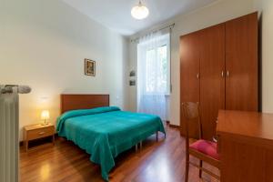 Llit o llits en una habitació de Piazza Re di Roma Apartment