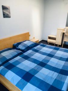 Postel nebo postele na pokoji v ubytování Horská chata Hugo