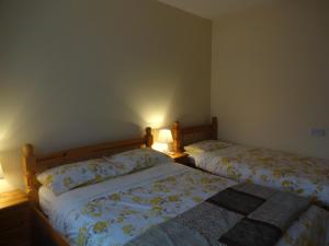 Cama o camas de una habitación en Currane Lodge