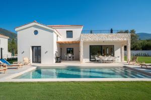 The swimming pool at or close to Ionian Trilogy Luxury Villas