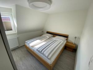 Postel nebo postele na pokoji v ubytování Design Fewo am Harz