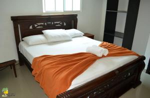 Una cama o camas en una habitación de Hotel Chayrama