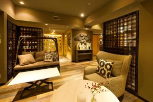 a living room with two chairs and a table at ANA InterContinental Tokyo by IHG in Tokyo