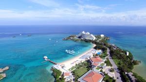 an aerial view of a cruise ship on a beach at ANA InterContinental Manza Beach Resort by IHG in Onna