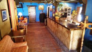 Lounge nebo bar v ubytování Cabañas Jimera de Líbar