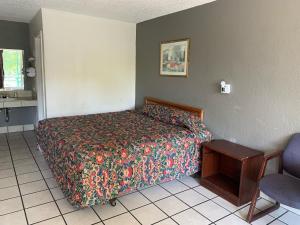 Postel nebo postele na pokoji v ubytování Budget Inn Motel