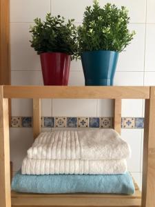Postel nebo postele na pokoji v ubytování Apartamento Ocuri + 26 fotografií