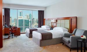 เตียงในห้องที่ InterContinental Doha The City by IHG