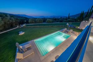 The swimming pool at or close to Ionian Trilogy Luxury Villas