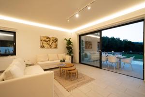 The swimming pool at or close to Ionian Trilogy Luxury Villas