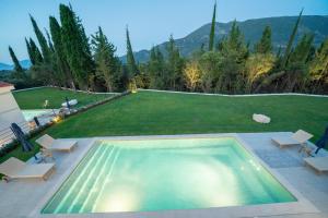 The swimming pool at or close to Ionian Trilogy Luxury Villas