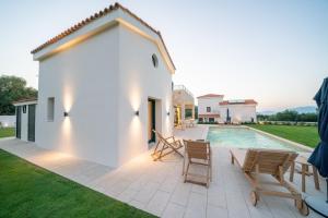 The swimming pool at or close to Ionian Trilogy Luxury Villas