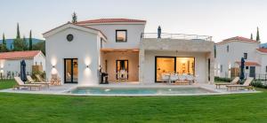 The swimming pool at or close to Ionian Trilogy Luxury Villas