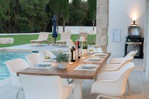 The swimming pool at or close to Ionian Trilogy Luxury Villas
