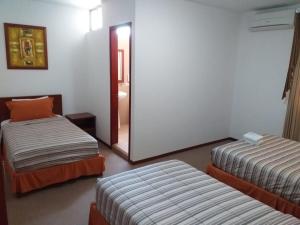 Hotel Samuria客房内的一张或多张床位