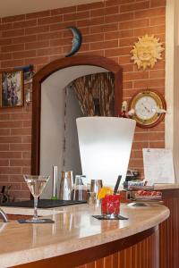 Nápoje v ubytování Hotel Parco delle Cale