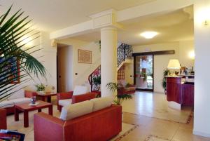 Posezení v ubytování Hotel Parco delle Cale